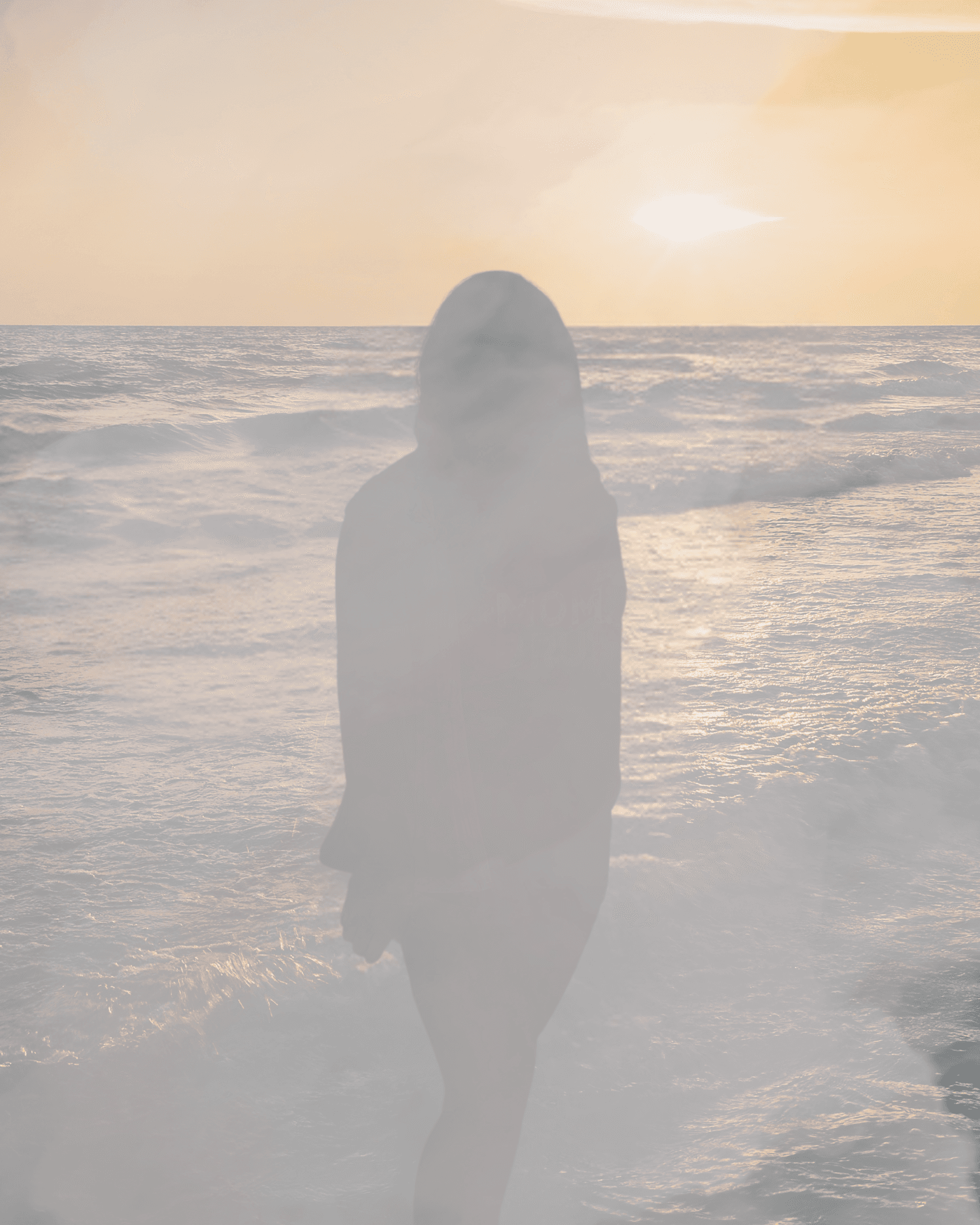 Soft sunset portrait; a quiet, reflective moment.